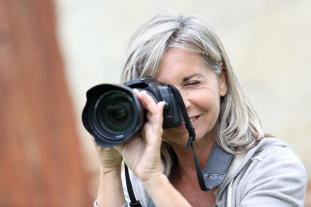 Glückliche Fotografin